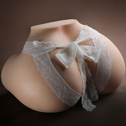 Realistic silicone torso with white lace thong, smooth skin texture, and detailed curves