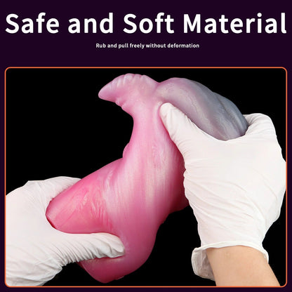 Soft pink realistic male masturbator with textured interior, shown being gently stretched by gloved hands