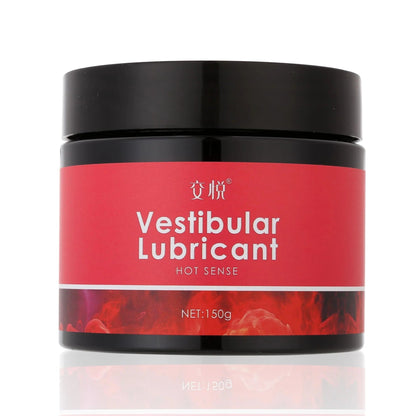 Black jar with red label reading Vestibular Lubricant Hot Sense, 150g, featuring bold white text and abstract design.