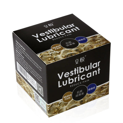Black box of Vestibular Lubricant with gold liquid design, labeled to reduce pain, 5.29 fl oz